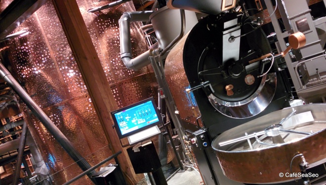 Starbucks Reserve Roastery & Tasting Room - All the machines, with the huge bronze coffee silo in the background