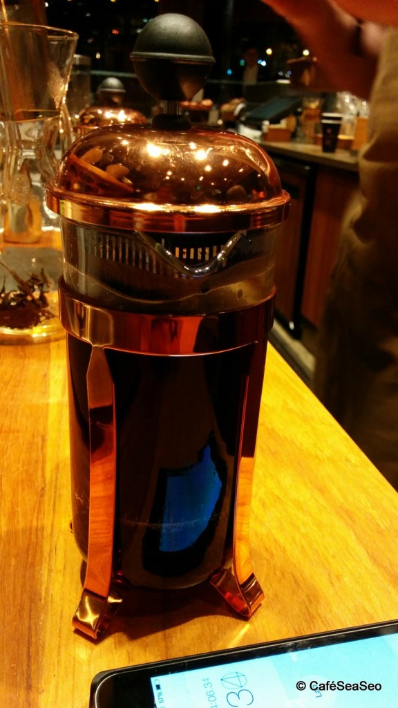 Starbucks Reserve Roastery & Tasting Room - Coffee press (French press) brewing my Pantheon blend, with the barista's phone acting as a timer